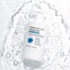 APLB Tranexamic Acid Niacinamide Body Lotion 300 ml pump bottle in water